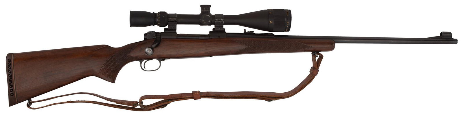 ** Winchester Model 70 Bolt Action Rifle: 30-06 caliber, 25" barrel, S/N 237483. Blue barrel and action. Checkered walnut stock with rubber recoil pad. Mounted with a BSA 6x-24x scope. **This rifle is in excellent condition with an excellent 