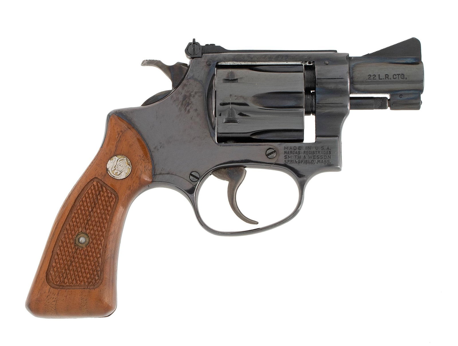 ** Smith and Wesson Model 34-1 Revolver in Original Box: .22 long rifle caliber, 2" barrel length, S/N M101425. Left side of the barrel marked "Smith & Wesson." Left side of the frame marked with small S&W logo. Right side of the barrel marked with