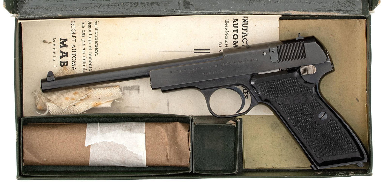 ** MAB Model F Pistol: .22 long rifle caliber, 6" barrel length, S/N 78C. Left side of the frame marked "Pistolet Automatique MAB Brevete" over "Modele F." Right side of the frame marked "Made in France." Front blade sight