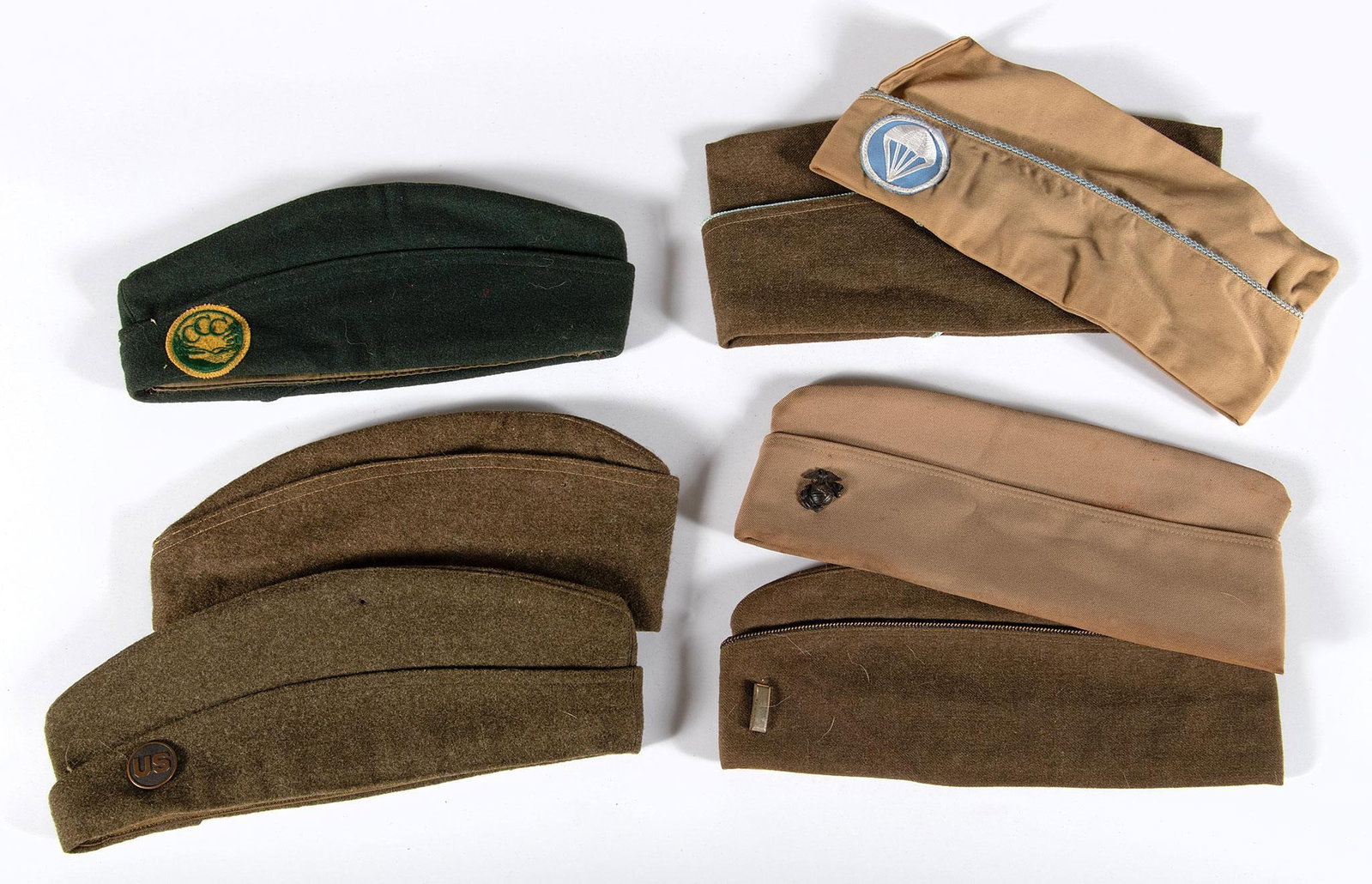Various U.S. Service Garrison Hats: Group of 20 U.S. military service garrison hats representing various ranks, including several foreign examples.