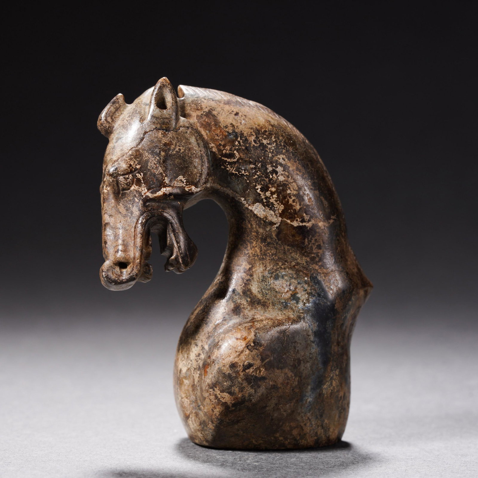 A Chinese Carved Soapstone Horse Head Han Dyn.: A Chinese Carved Soapstone Horse Head Han Dyn. L:3.5cm; W:2cm; H:6.5cm; 90g