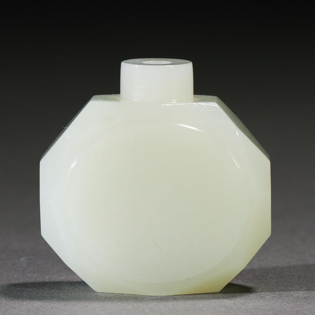 A Chinese Carved White Jade Snuff Bottle: A Chinese Carved White Jade Snuff Bottle H:5cm:W:5cm; 70g