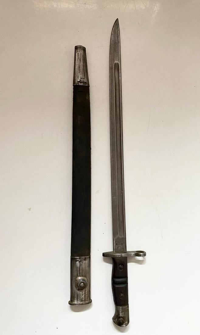 Antique WWI 1913 British American Remington Knife. The: Antique WWI 1913 British American Remington Knife. The ricasso is marked one one side with 1913 and 5 & 17 together with the Remington mark. Blade 43cm, total length 58cm.