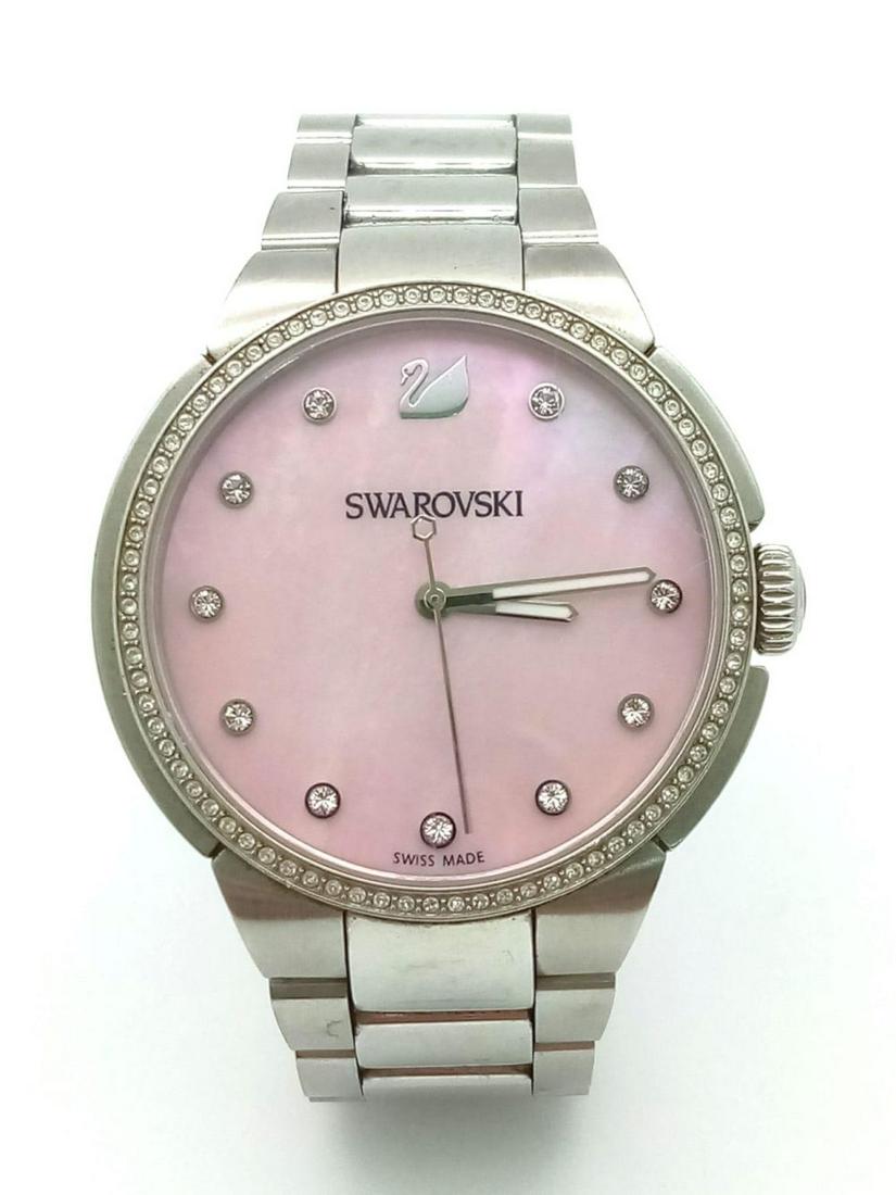 SWAROVSKI CITY PINK FACE, BRACELET WATCH REFERENCE 5205993. FULL WORKING ORDER, EXCELLENT: SWAROVSKI CITY PINK FACE, BRACELET WATCH REFERENCE 5205993. FULL WORKING ORDER, EXCELLENT CONDITION. 38MM