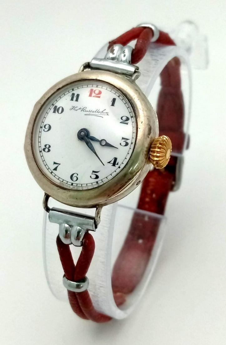 A Vintage Sterling Silver Thomas Russell and Son Watch. Case - 26mm. Mechanical movement in working: A Vintage Sterling Silver Thomas Russell and Son Watch. Case - 26mm. Mechanical movement in working order but because of age no guarantees.