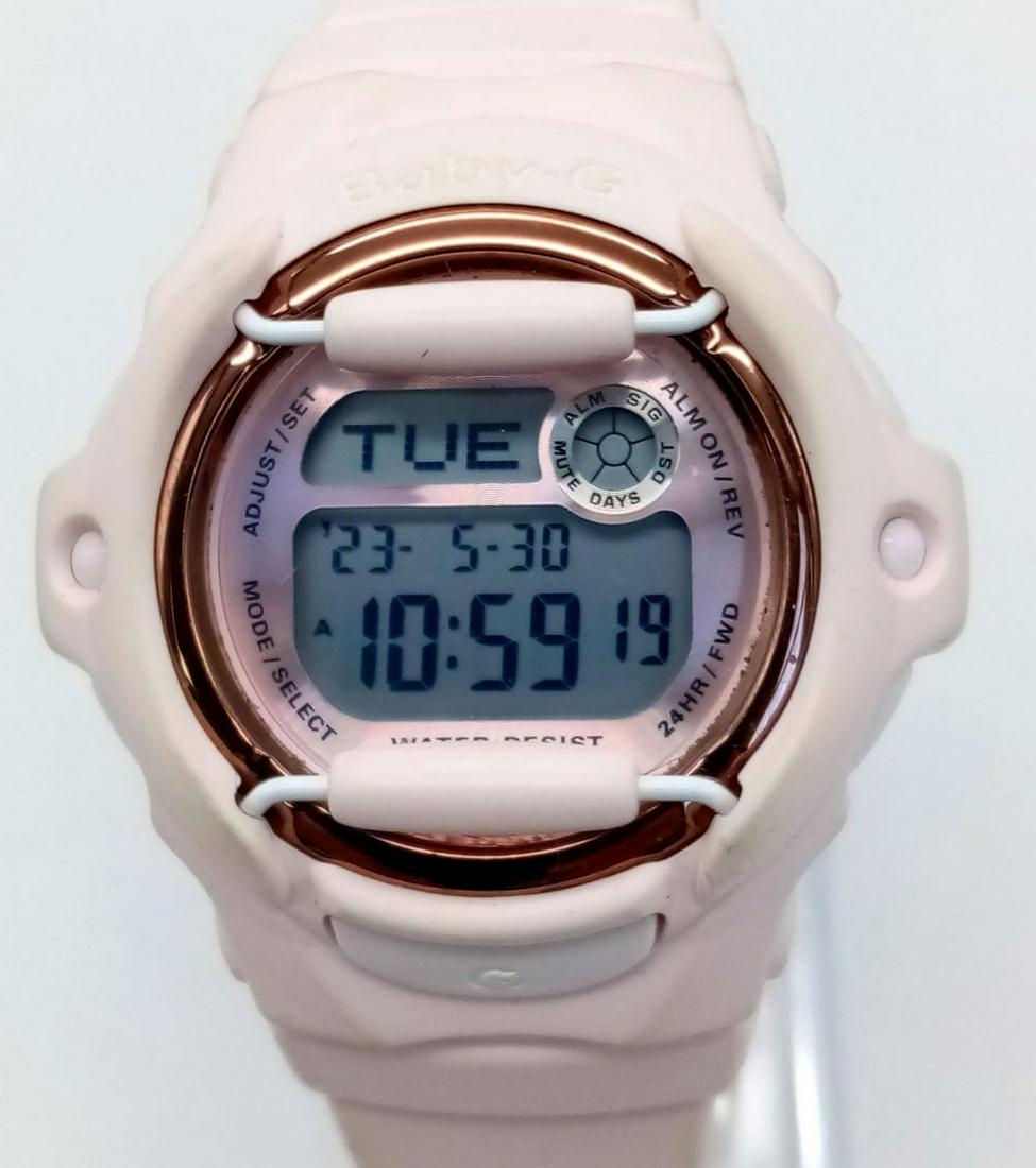 A Pink Baby G Shock Digital Ladies Watch. Pink hard rubber strap and case - 38mm. Digital dial. In: A Pink Baby G Shock Digital Ladies Watch. Pink hard rubber strap and case - 38mm. Digital dial. In good condition and working order.