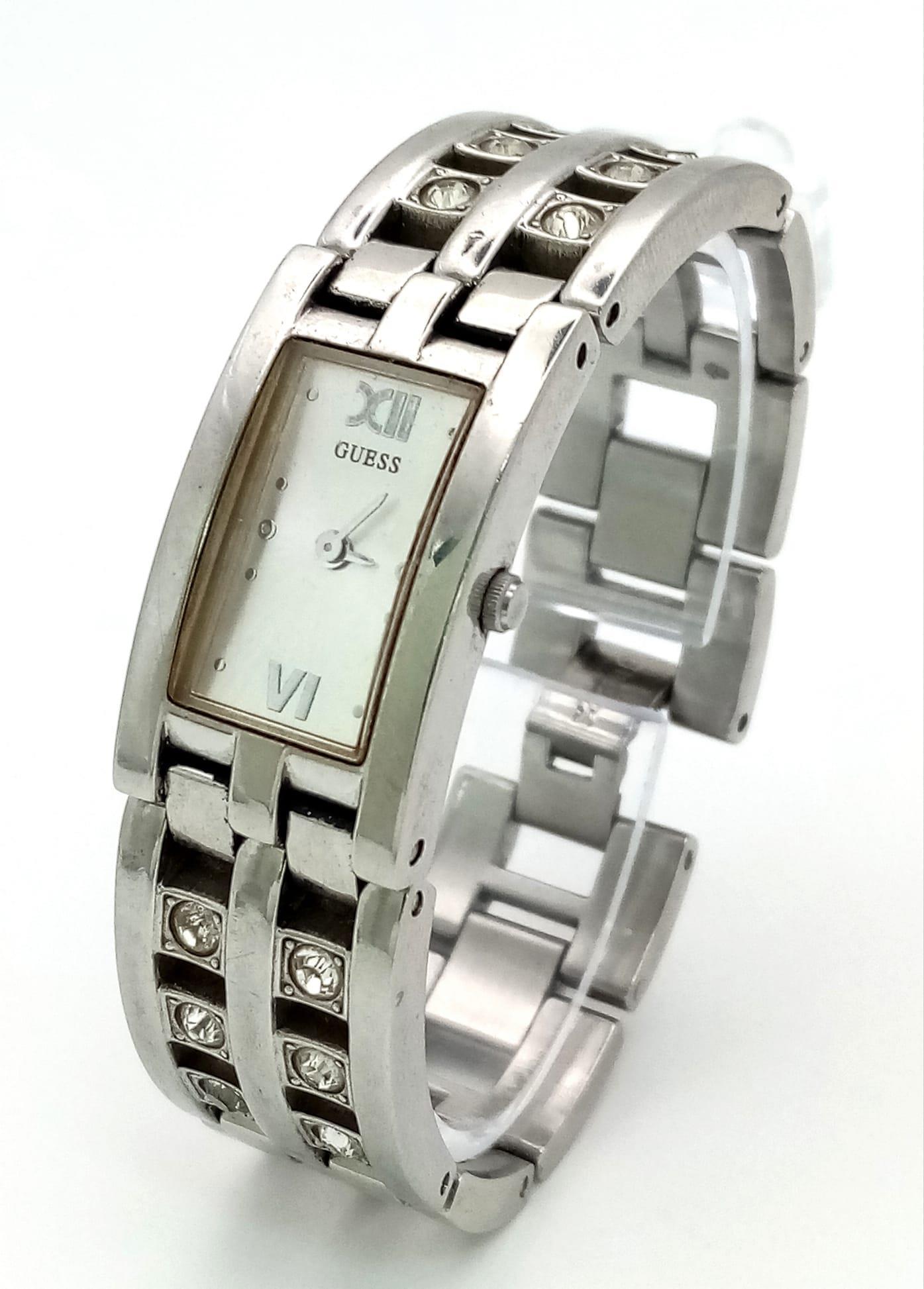 GUESS STAINLESS STEEL BRACELET WATCH FULL WORKING ORDER. 3CM X 2CM. A/F: GUESS STAINLESS STEEL BRACELET WATCH FULL WORKING ORDER. 3CM X 2CM. A/F