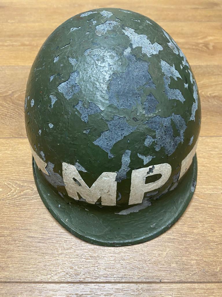 A Ww2 Usa M1 Mp Helmet. The Paint Is Flaky From Age, But The Majority