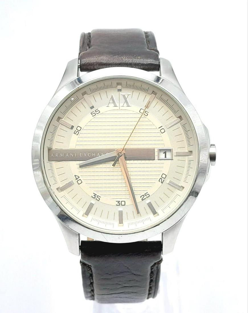 An Armani Exchange Large Dial Gents Watch. Brown leather strap, stainless steel case - 46mm. Cream: An Armani Exchange Large Dial Gents Watch. Brown leather strap, stainless steel case - 46mm. Cream dial with date window. Quartz movement in working order.