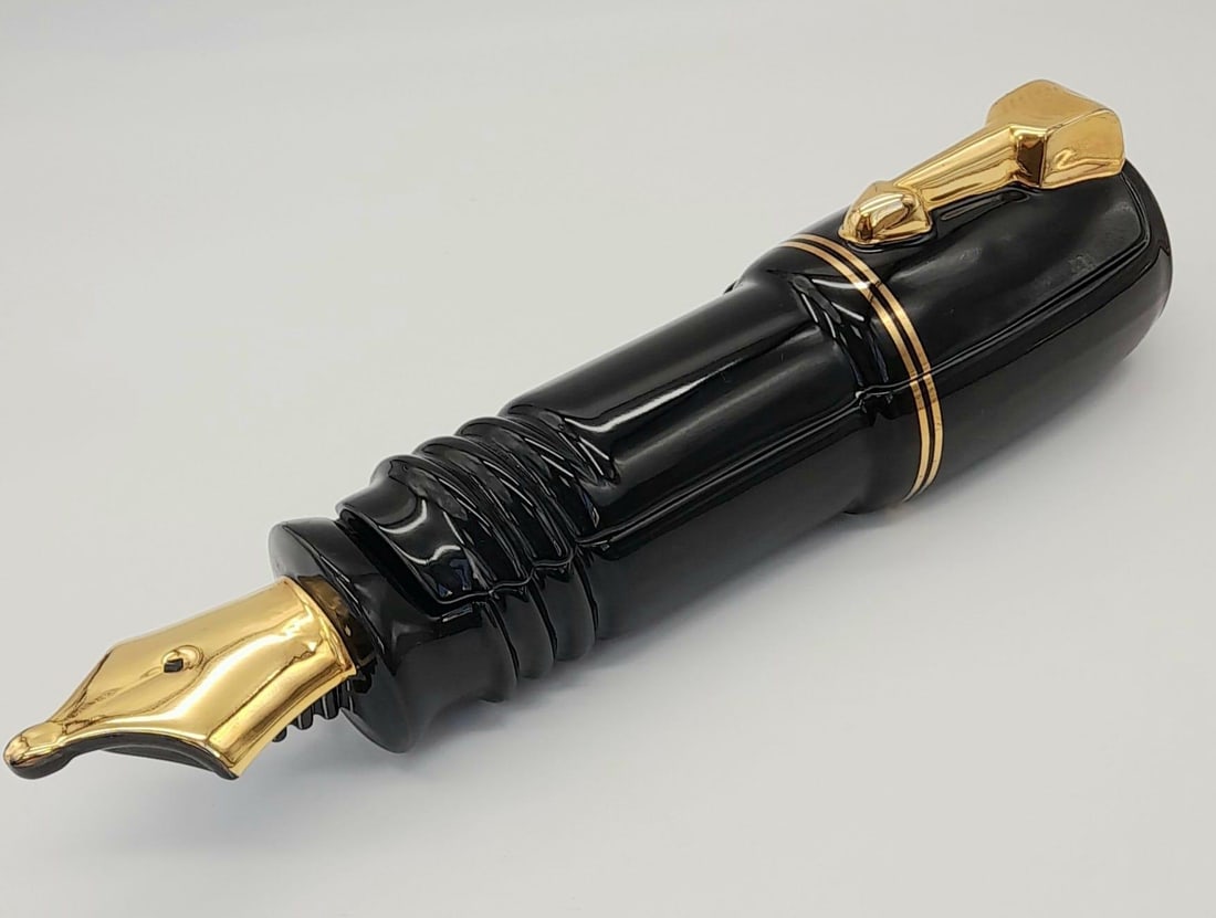 A Large Ceramic Fountain Pen Shaped Desk Storage Container. Store your pens in your pen! 35cm length: A Large Ceramic Fountain Pen Shaped Desk Storage Container. Store your pens in your pen! 35cm length
