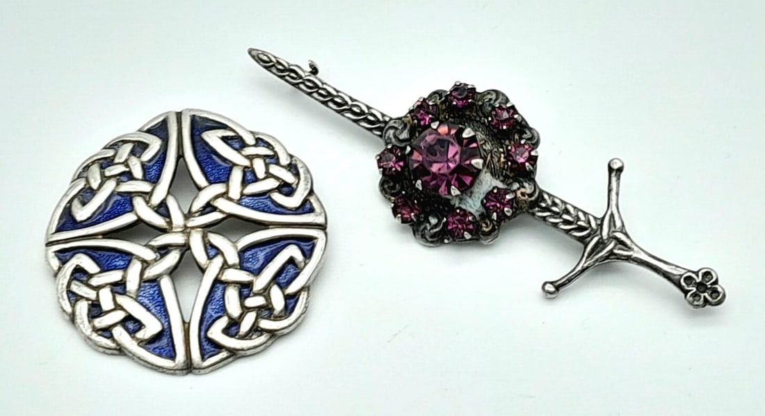 Two Scarce Scottish Celtic Silver Vintage Brooches Including one by the renown maker Ward Brothers.: Two Scarce Scottish Celtic Silver Vintage Brooches Including one by the renown maker Ward Brothers. Comprising; 1) Ward Brothers Sterling Silver Purple Stone Set Sword Brooch 7cm Length & Sterling Sil