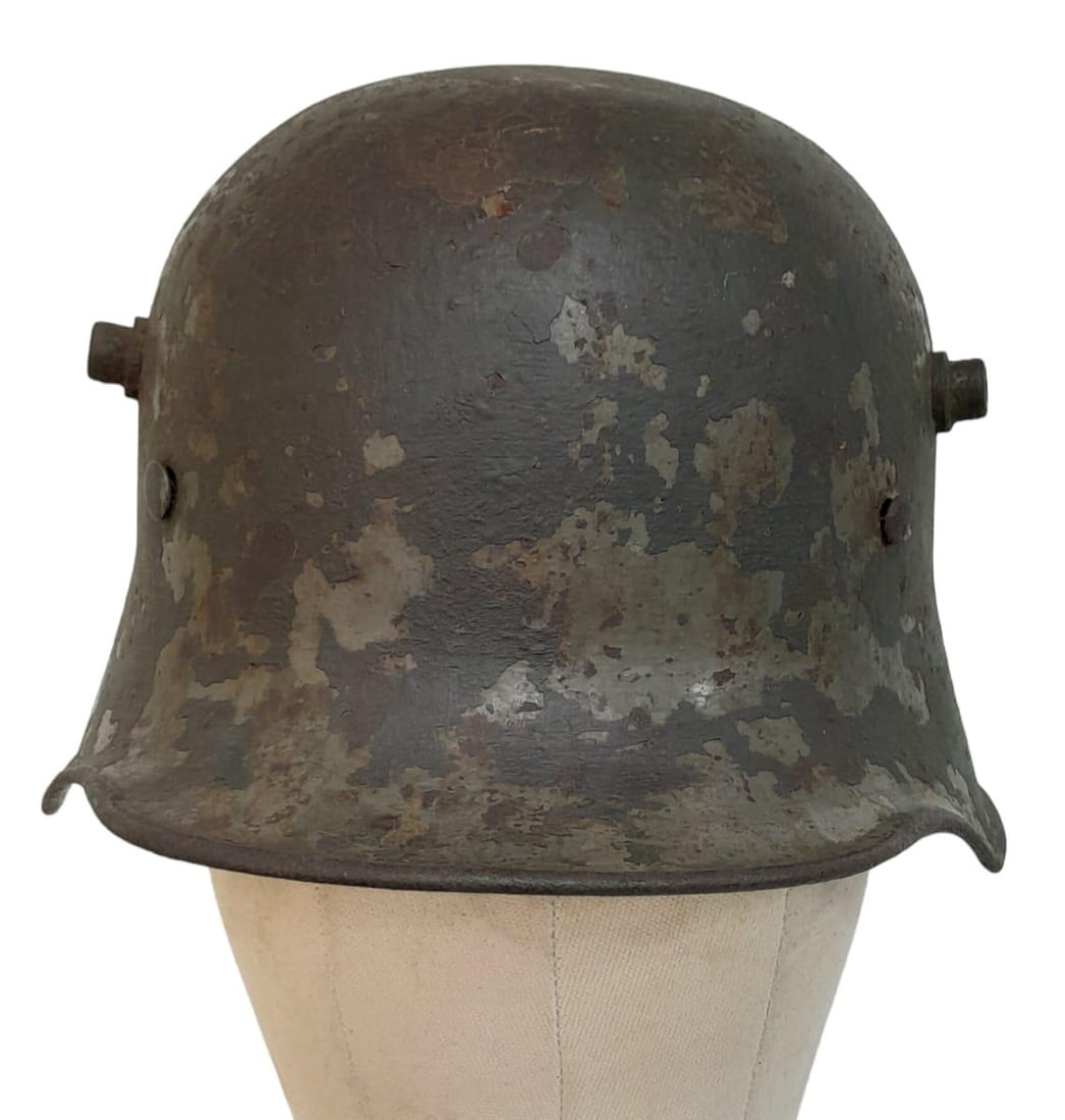 Inter War Period German Friekorps Helmet. A WW1 Imperial German M18 Helmet shell with a 1935 model: Inter War Period German Friekorps Helmet. A WW1 Imperial German M18 Helmet shell with a 1935 model liner.