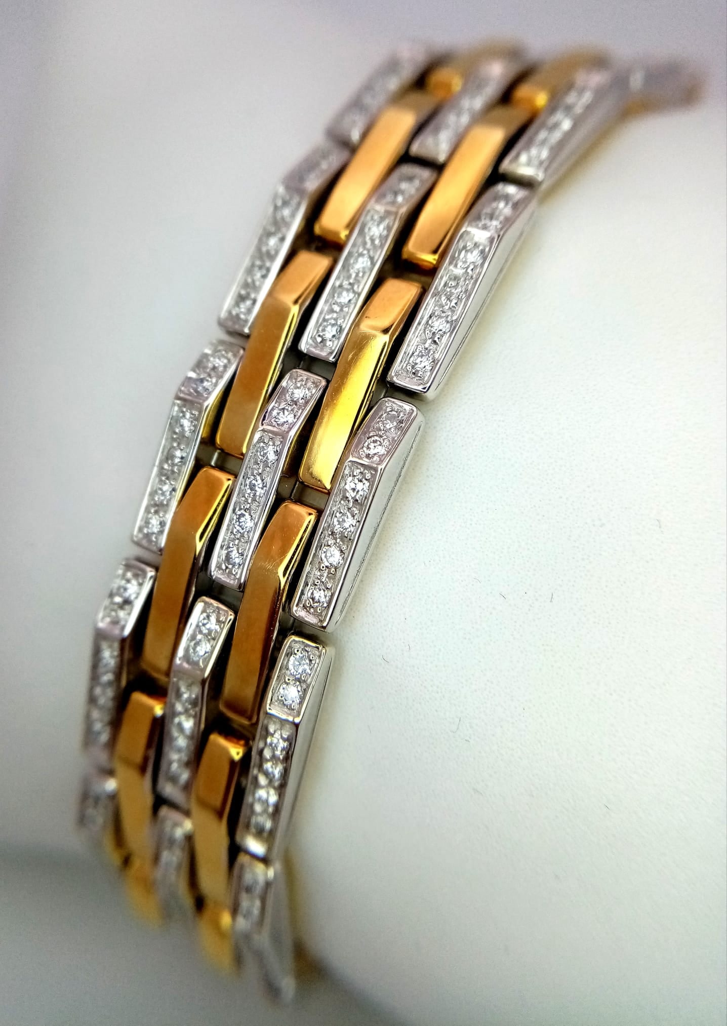 A Beautiful Italian Designed Chimento 18K Gold and Diamond Bar Bracelet. Three rows of diamond bars: A Beautiful Italian Designed Chimento 18K Gold and Diamond Bar Bracelet. Three rows of diamond bars - 3ctw with alternating 18k gold bars. This is a rare piece that was bought in Italy and is in excel