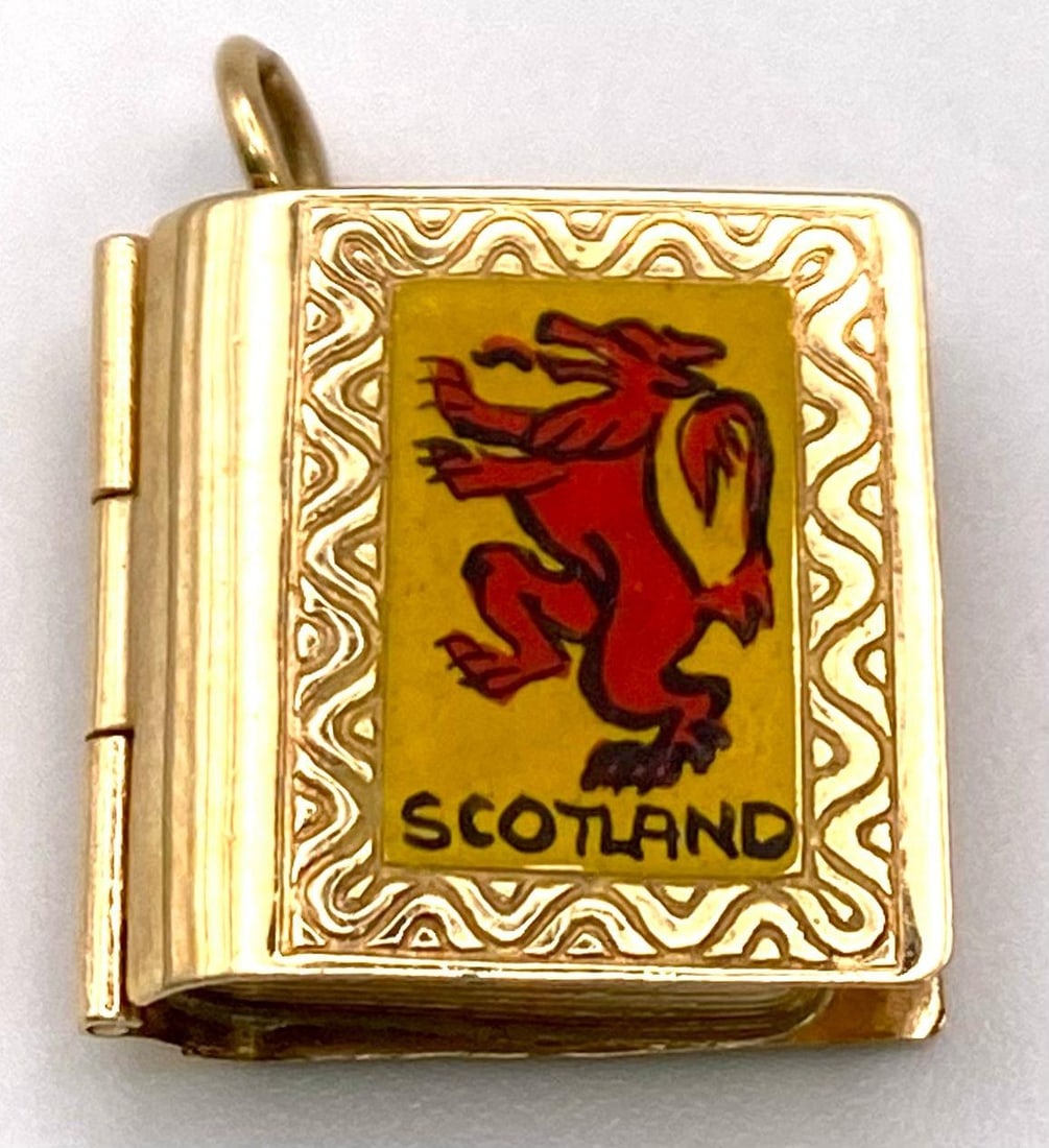 9K Yellow Gold Scottish Book Charm/Pendant. Opens to reveal famous landmarks in Scotland, such as: 9K Yellow Gold Scottish Book Charm/Pendant.Opens to reveal famous landmarks in Scotland, such as Ben Nevis & Port William and more.Weight: 2.3gSC-3056