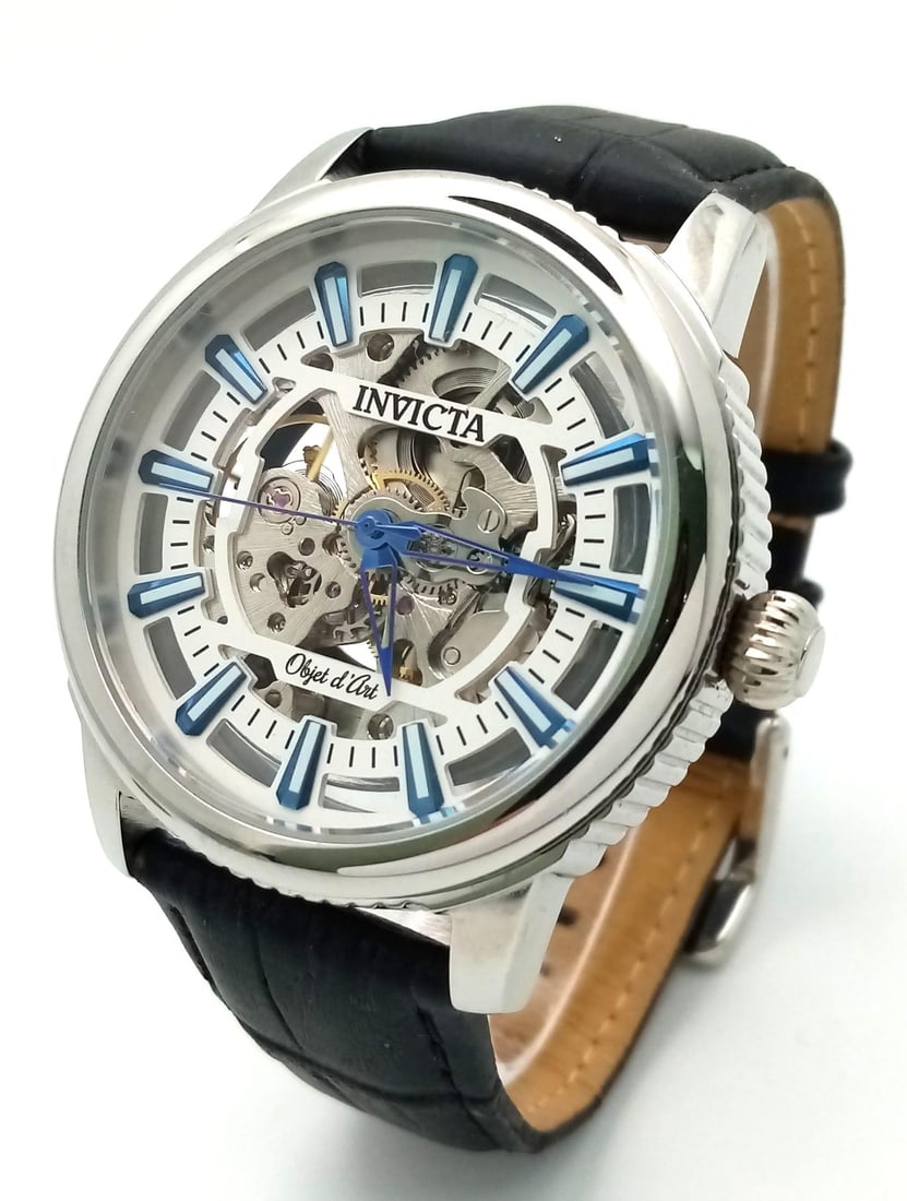 An Invicta Skeleton Automatic Gents Watch. Black leather strap. Stainless steel skeleton case -: An Invicta Skeleton Automatic Gents Watch. Black leather strap. Stainless steel skeleton case - 41mm. In good condition and working order.