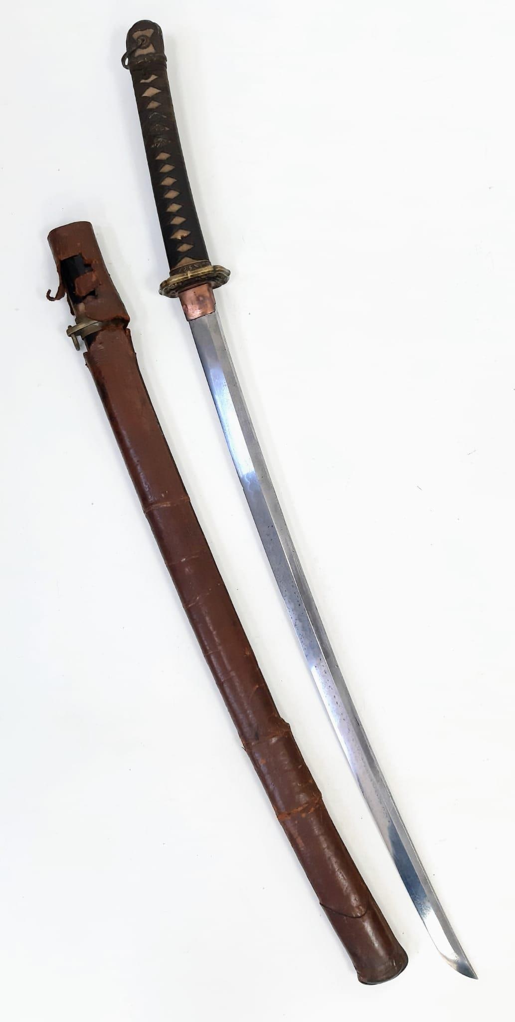 WW2 Japanese Officers Type 98?Shin-Gunt??Sword. Leather combat scabbard. Nice markings on the Tang,: WW2 Japanese Officers Type 98 Shin Gunto Sword. Leather combat scabbard. Nice markings on the Tang, maybe a family blade. Typical wavy Hamon, edge of the blade. Very samll chip on in the blade about 2