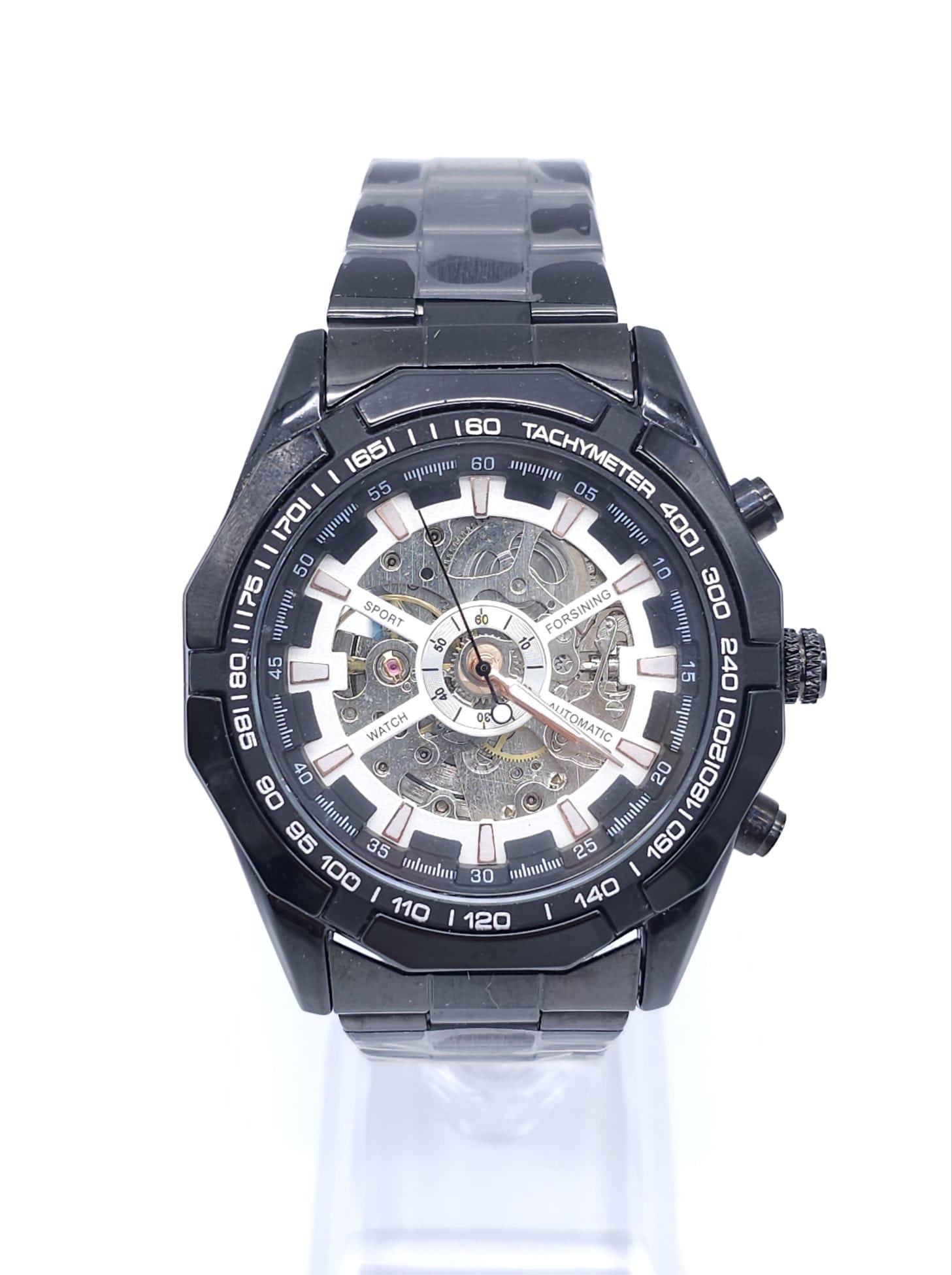An Unworn Black Tachymeter Tm 340 Automatic Men?s Skeleton Face Watch