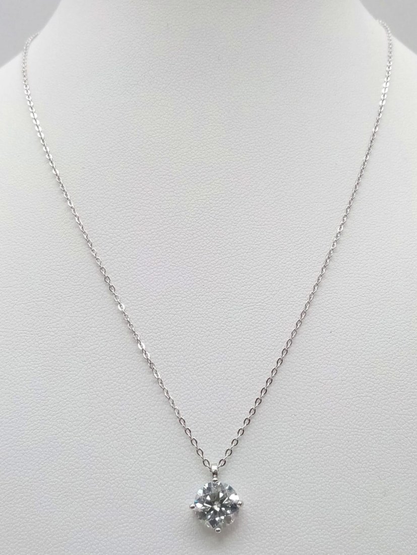 Sterling Silver Necklace with a lovely Moissanite Stone Pendant. Weight: 2.24g: Sterling Silver Necklace with a lovely Moissanite Stone Pendant. Weight: 2.24g