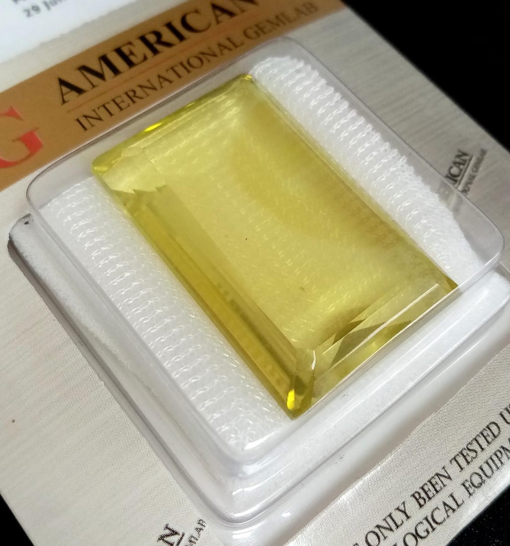 A Sealed Madagascar 86.03ct Lemon Yellow Quartz, Eye Clean. AIG Certified Origin: A Sealed Madagascar 86.03ct Lemon Yellow Quartz, Eye Clean. AIG Certified Origin