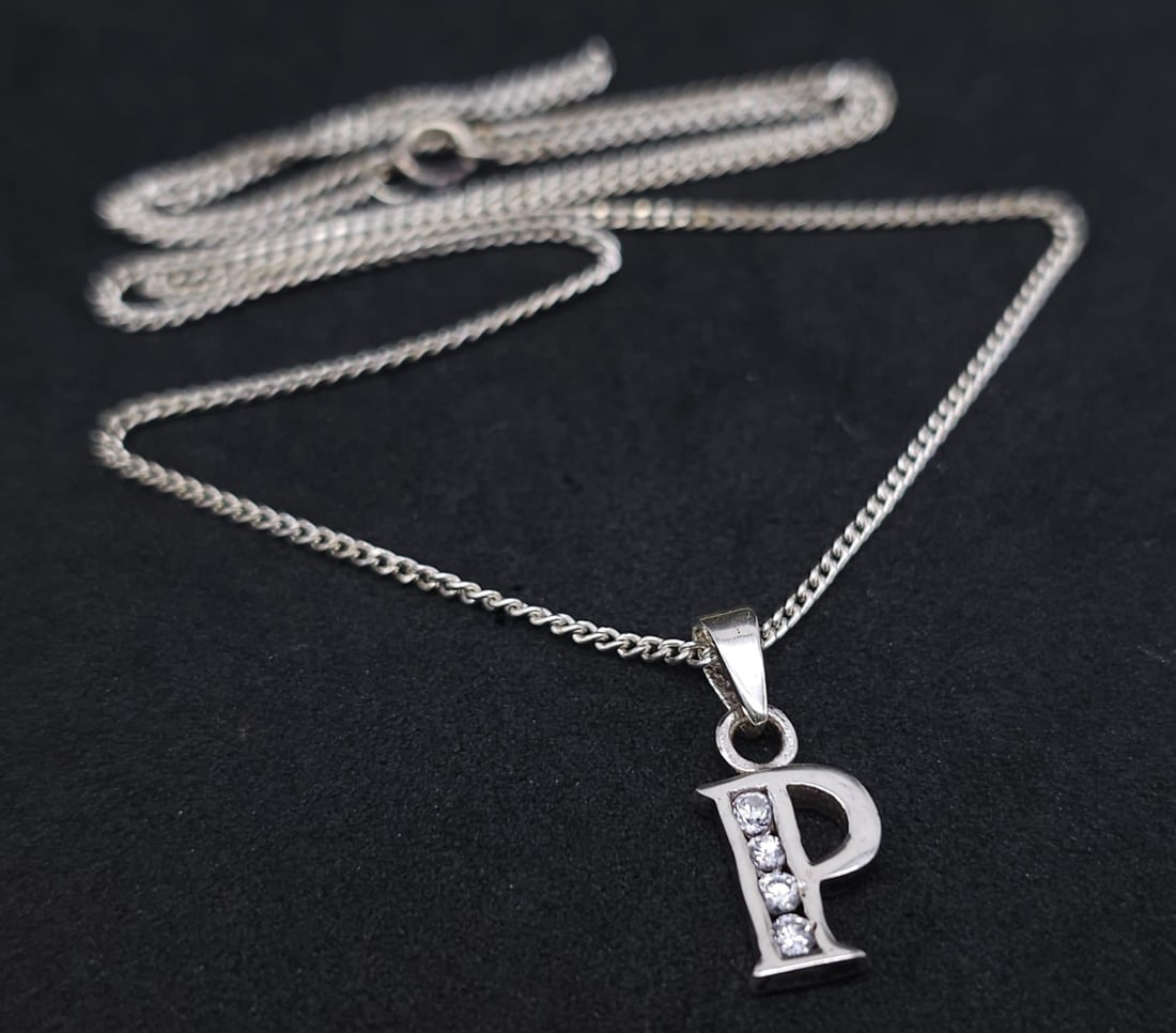 An Unworn, Ex Display, Sterling Silver, Stone Set, Letter ?P? Pendant Necklace. 46cm Length Chain.: An Unworn, Ex Display, Sterling Silver, Stone Set, Letter ?P? Pendant Necklace. 46cm Length Chain. Pendant Measures 1.8cm Drop. Comes in Presentation Box.