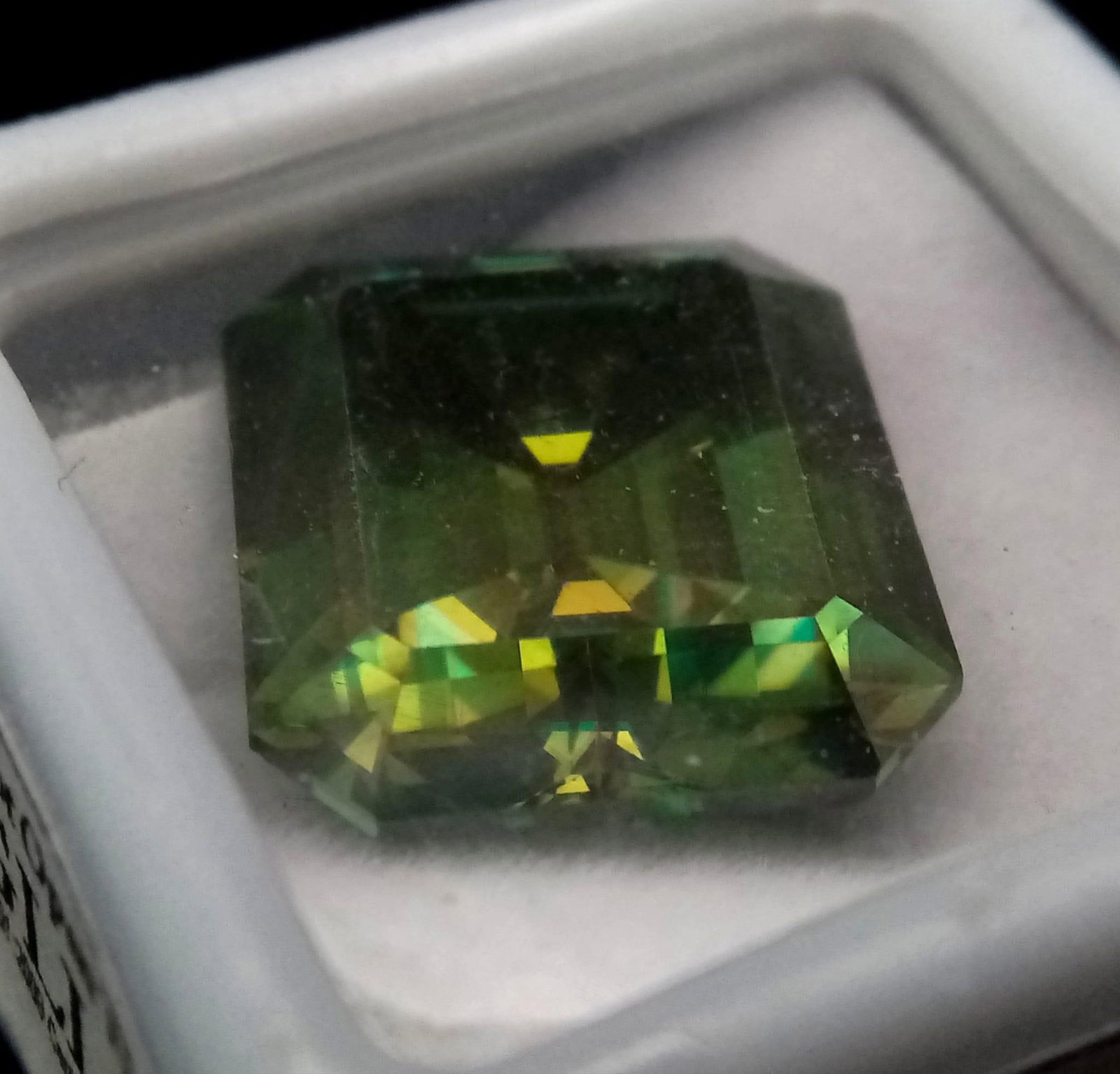 A 17.8ct Emerald-Cut Blue Moissanite - Comes with a GLI certificate.: A 17.8ct Emerald-Cut Blue Moissanite - Comes with a GLI certificate.
