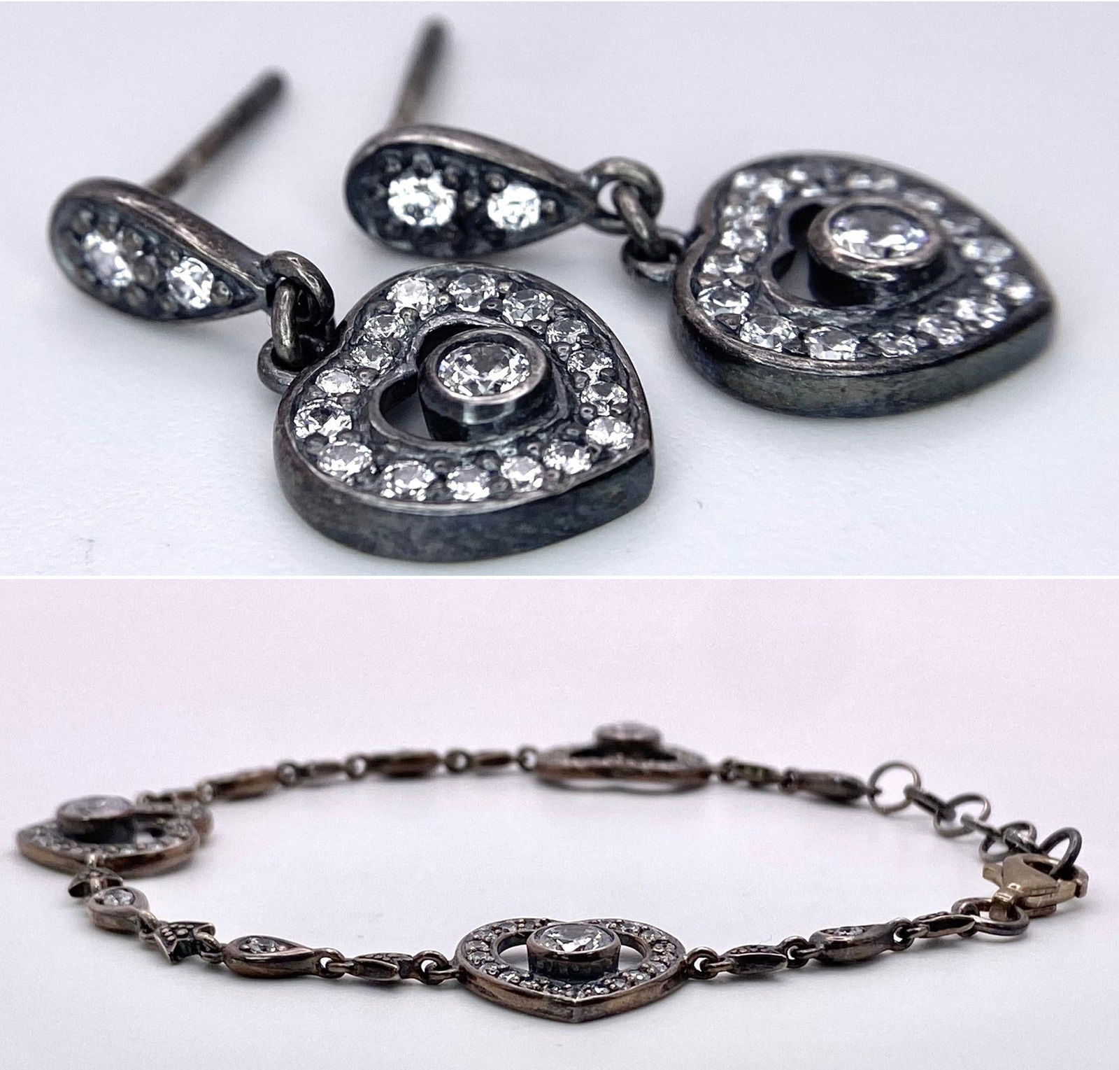 A pair of fancy 925 silver stone set heart link bracelets with 21cm length & A pair of silver heart: A pair of fancy 925 silver stone set heart link bracelets with 21cm length & A pair of silver heart cluster earrings. Total weight 21G.