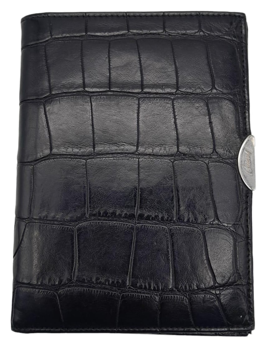 Brioni Black Crocodile Leather Unisex Wallet. Lovely soft leather exterior with silver tone accent.: Brioni Black Crocodile Leather Unisex Wallet.Lovely soft leather exterior with silver tone accent. Opens to reveal two slots on left and several card holder slots on right. Top opens out for notes. Me