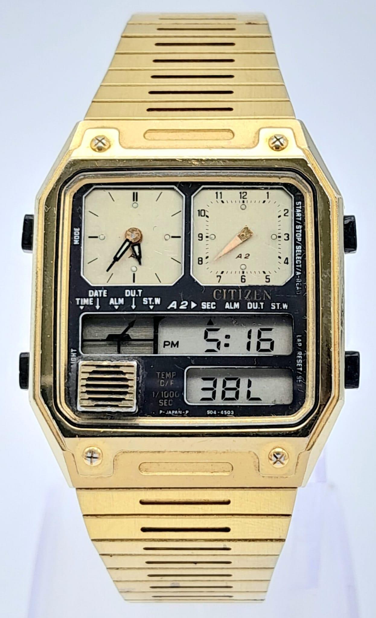 An Interesting Vintage Citizen Multi-Time Watch. Analogue and digital sub dials. Gold plated. Quartz: An Interesting Vintage Citizen Multi-Time Watch. Analogue and digital sub dials. Gold plated. Quartz movement in working order.
