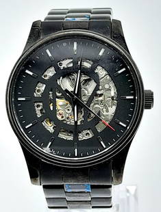 An Unworn Ex Display Caravelle New York (Bulova) Men?s Skeleton Automatic Watch. 45mm Including: An Unworn Ex Display Caravelle New York (Bulova) Men?s SkeletonAutomatic Watch. 45mm Including Crown. With Box and Papers. Protective Covers in place.