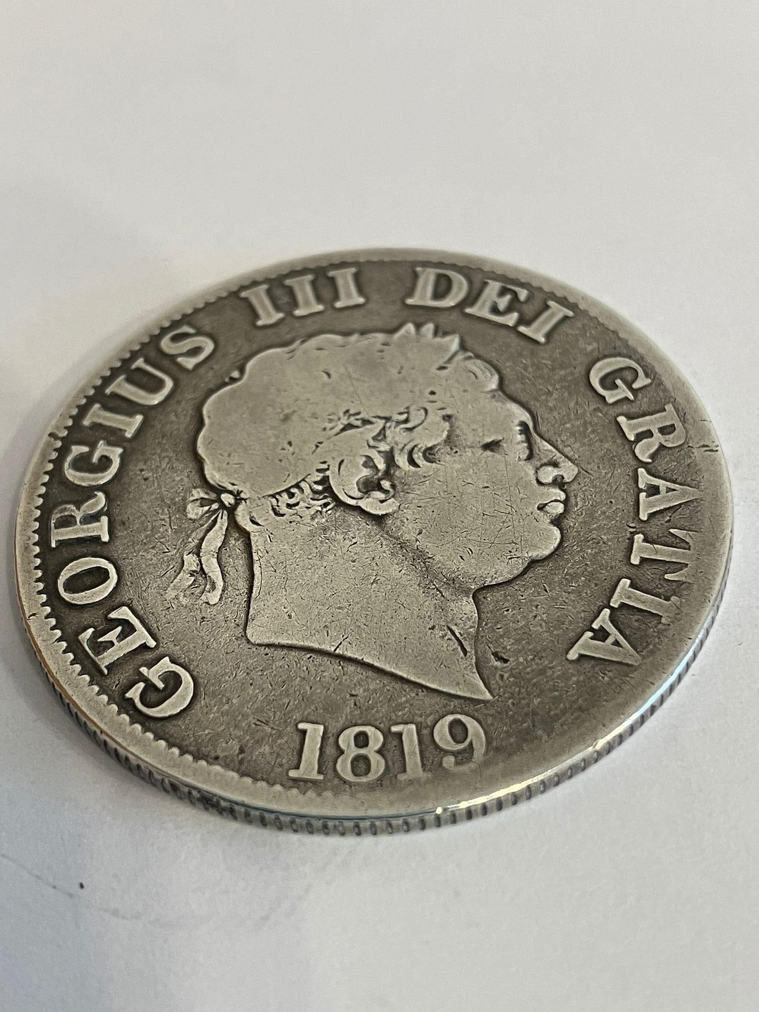1819 SILVER GEORGE III HALF CROWN. Overall Condition fair.: 1819 SILVER GEORGE III HALF CROWN. Overall Condition fair.