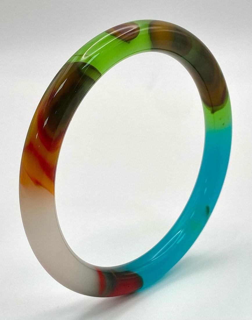 A Kaleidoscopic Jade Thin Bangle. 6cm inner diameter. 8mm width.: A Kaleidoscopic Jade Thin Bangle. 6cm inner diameter. 8mm width.