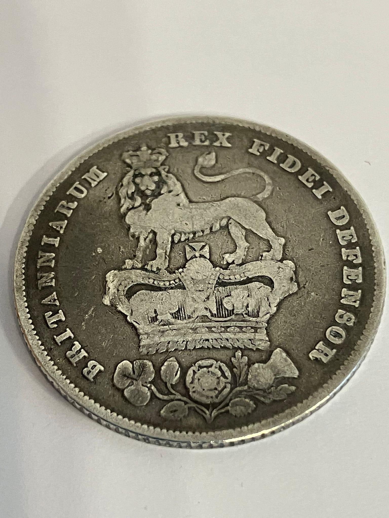1826 GEORGE IV SILVER SHILLING in Very fine condition. Having bold and raised definition to both: 1826 GEORGE IV SILVER SHILLING in Very fine condition. Having bold and raised definition to both sides.