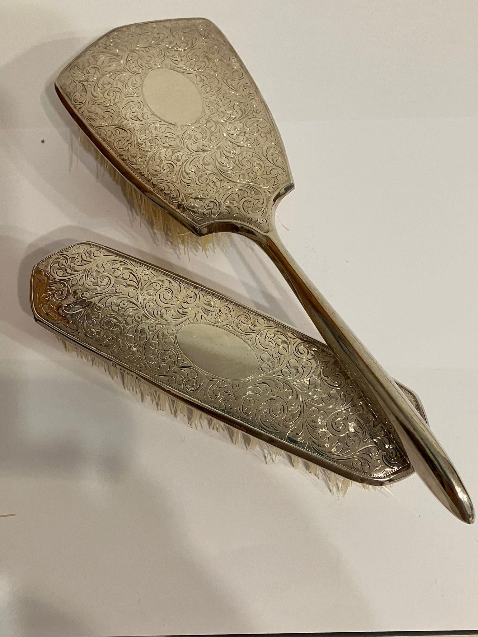 Vintage Pair of Beautifully decorated SILVER DRESSING TABLE BRUSHES.: Vintage Pair of Beautifully decorated SILVER DRESSING TABLE BRUSHES.