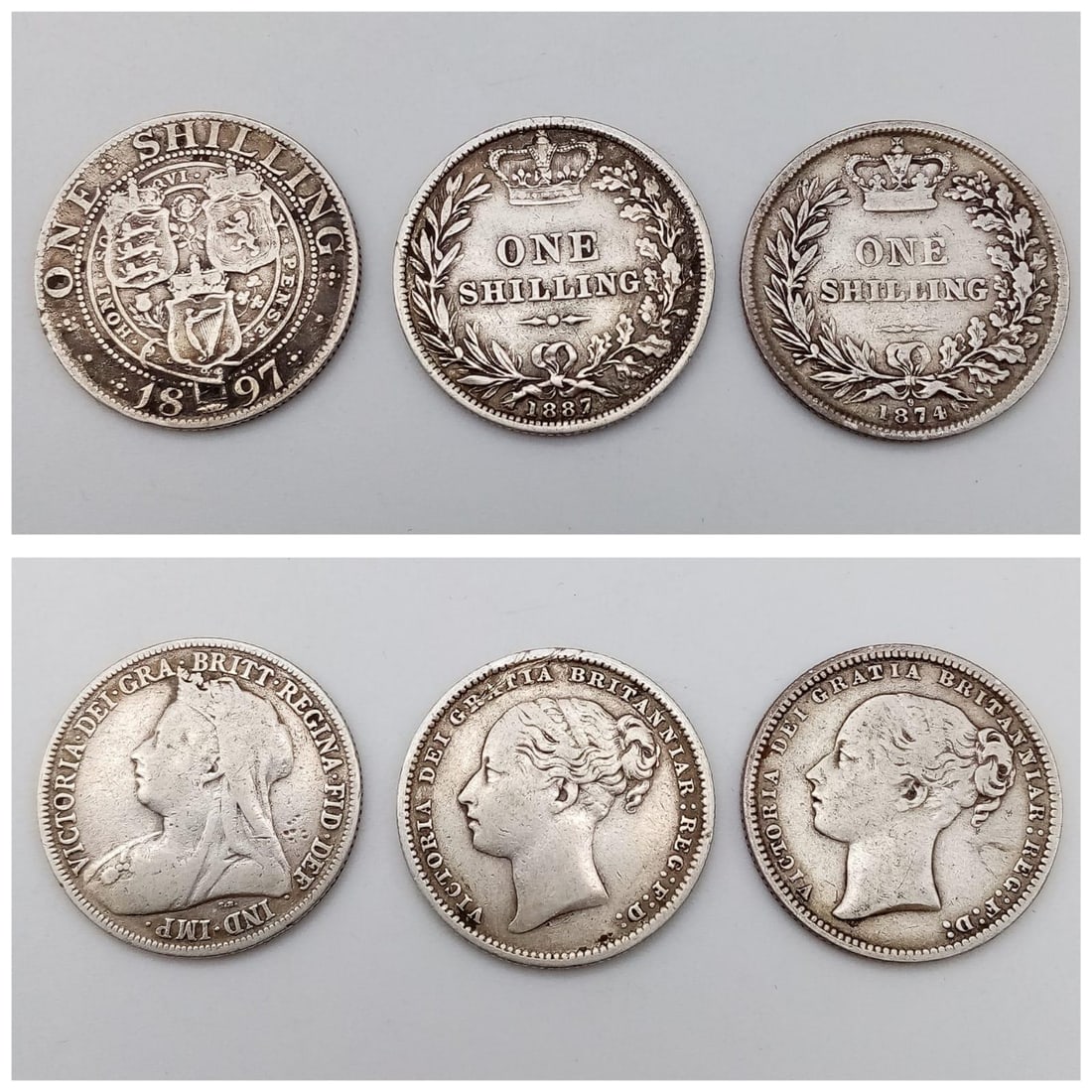 Three Queen Victoria Silver Shilling Coins - 1874, 1887 and 1897. Please see photos for conditions.: Three Queen Victoria Silver Shilling Coins - 1874, 1887 and 1897. Please see photos for conditions.