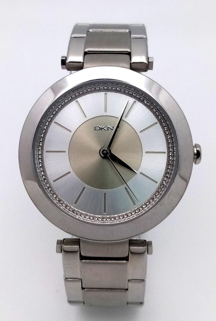An Excellent Condition Stainless Steel Quartz Watch by Donna Karen New York (DKNY). 38mm Including: An Excellent Condition Stainless Steel Quartz Watch by Donna Karen New York (DKNY). 38mm Including Crown. New Battery fitted January 2024 and Full Working Order.