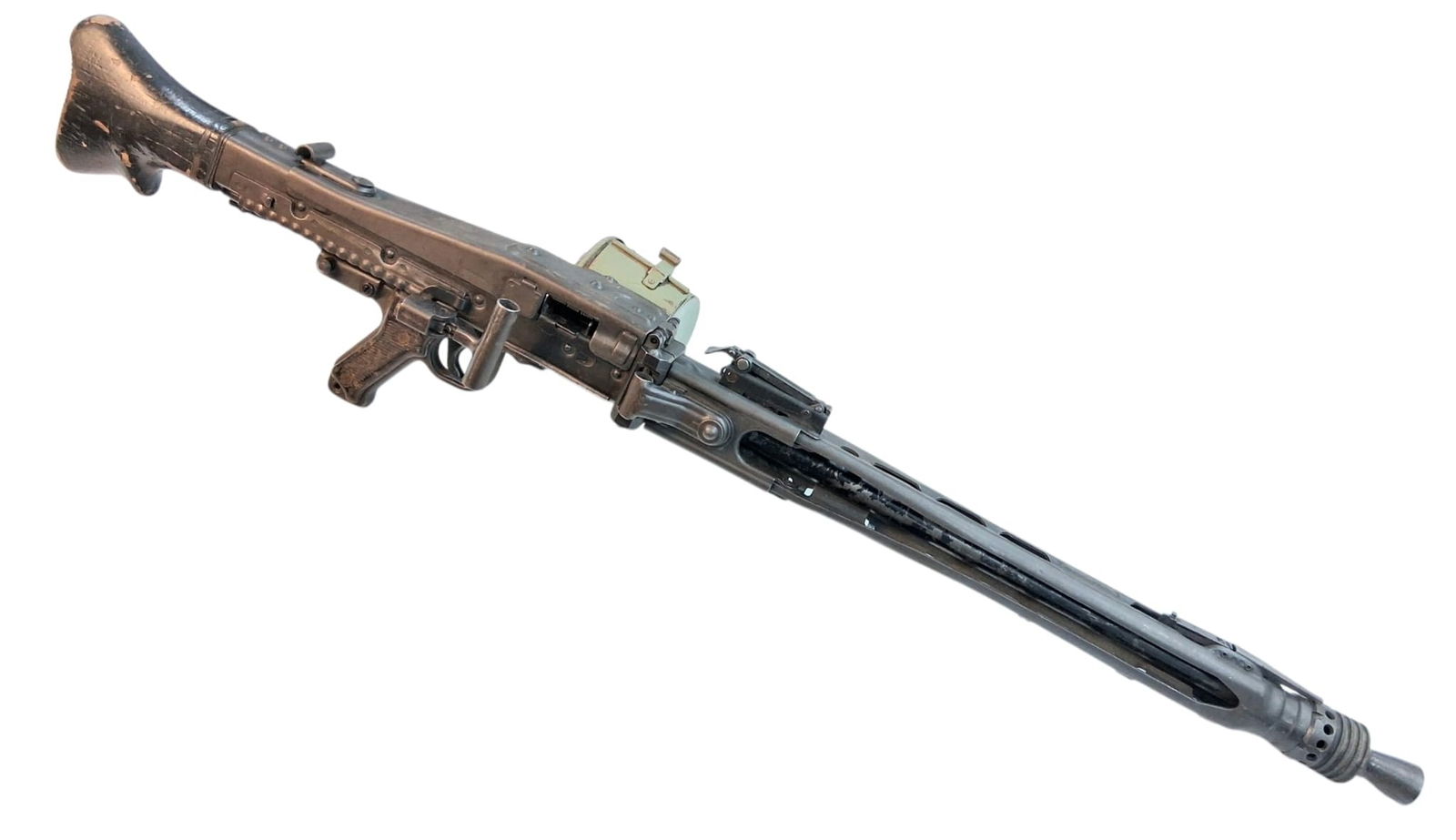 A Deactivated Vintage Yugoslavian MG42 Light Machine Gun. Fitted with drum magazine and bipod. 7.: A Deactivated Vintage Yugoslavian MG42 Light Machine Gun. Fitted with drum magazine and bipod. 7.92 calibre. 26 inch barrel. Comes with a UK deactivation certificate. UK sales only. Winning bidder is