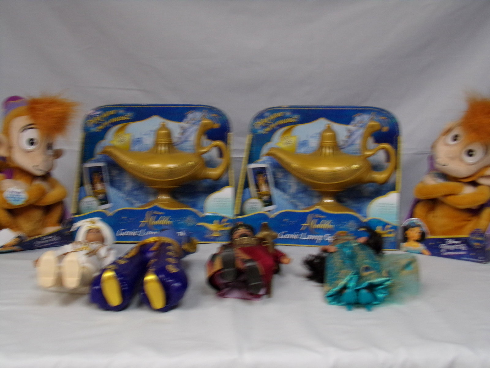 aladdin lot: lot of aladdin items w/talking abu figures and lamp speaker