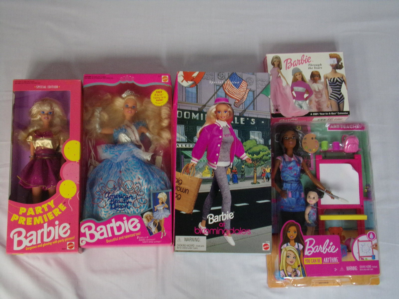 barbies: lot of 4 barbies w/2001 calender