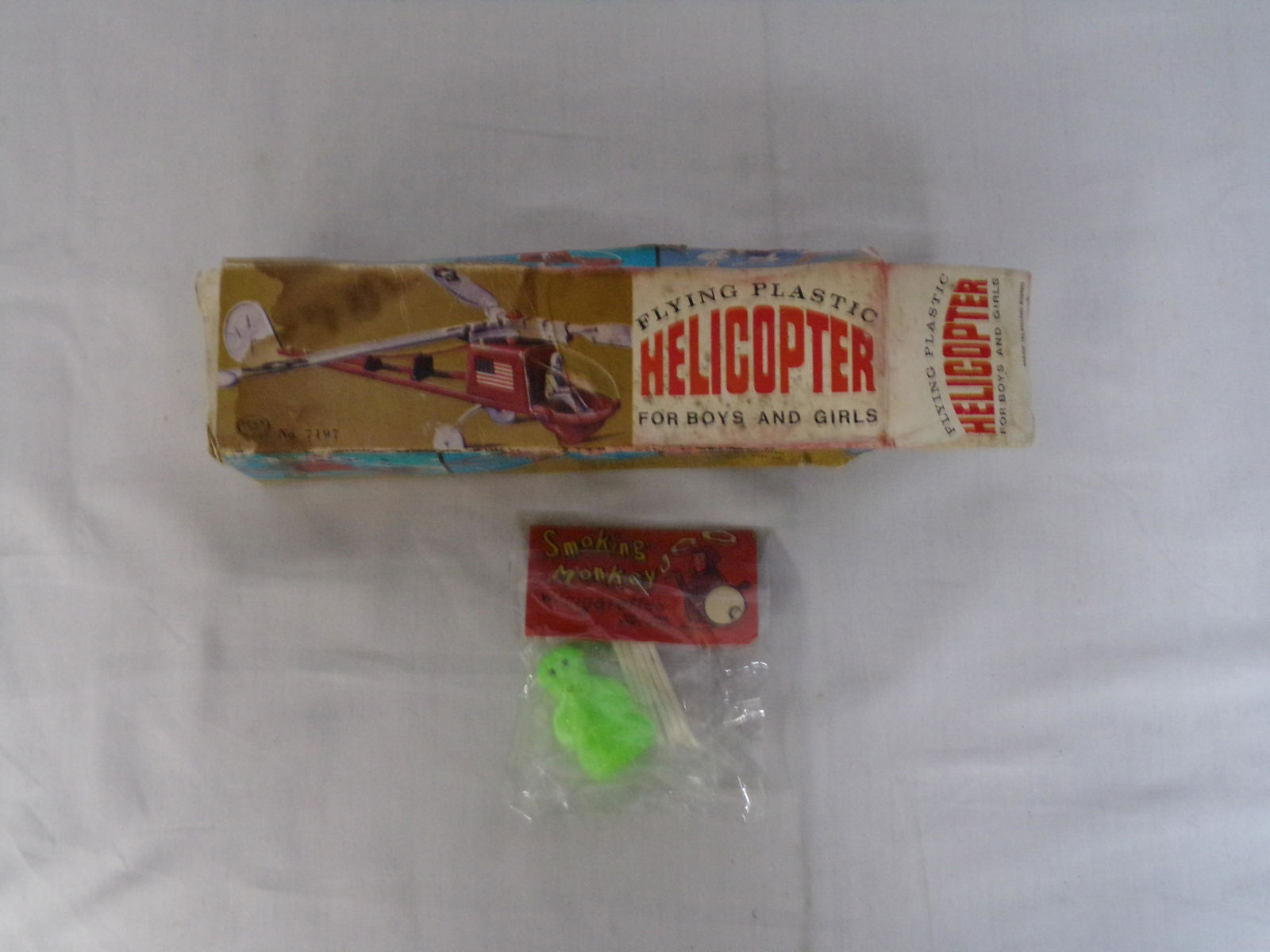 vintage toy lot: lot of vtg toys w/ smoking monkey and flying plastic helicopter