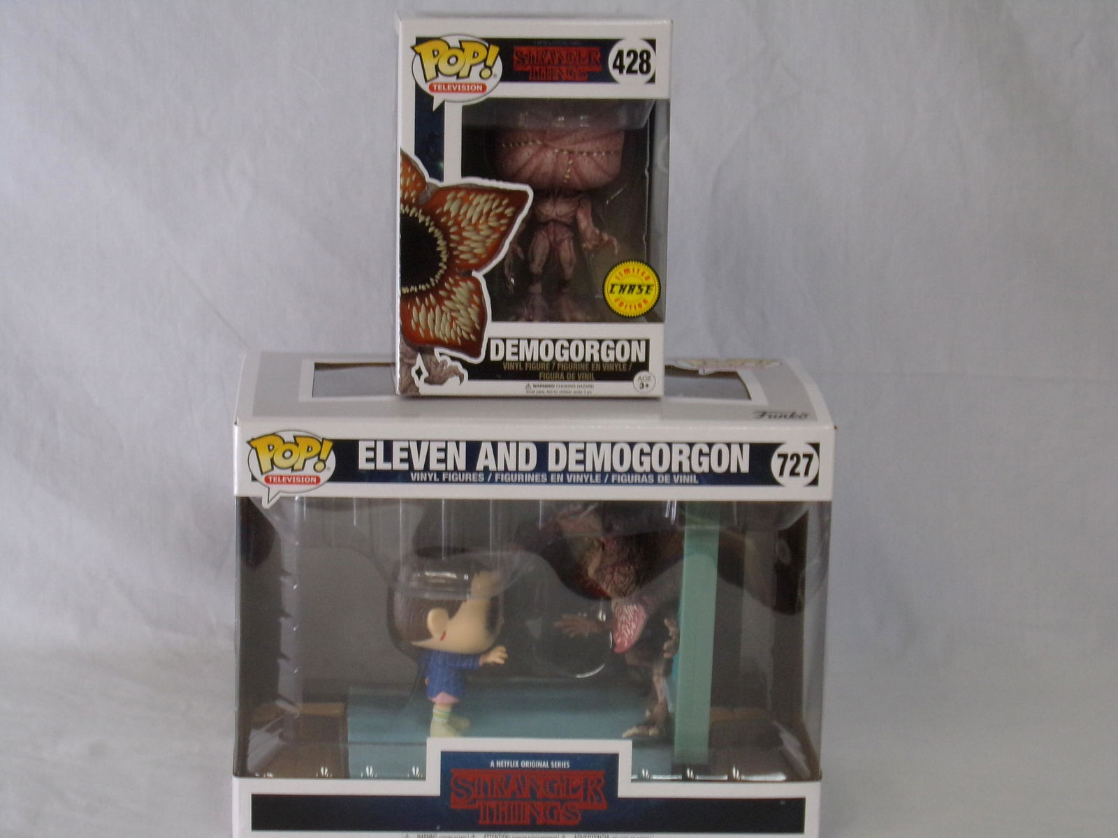 lot of 2 funko pops stranger things eleven w/ (1 of 3)