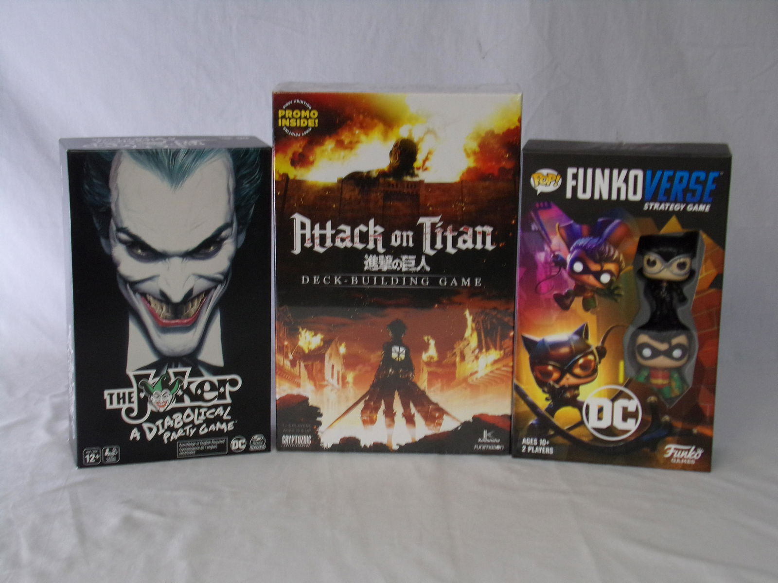 lot of 3 new sealed games w/ joker attack on titan (1 of 4)