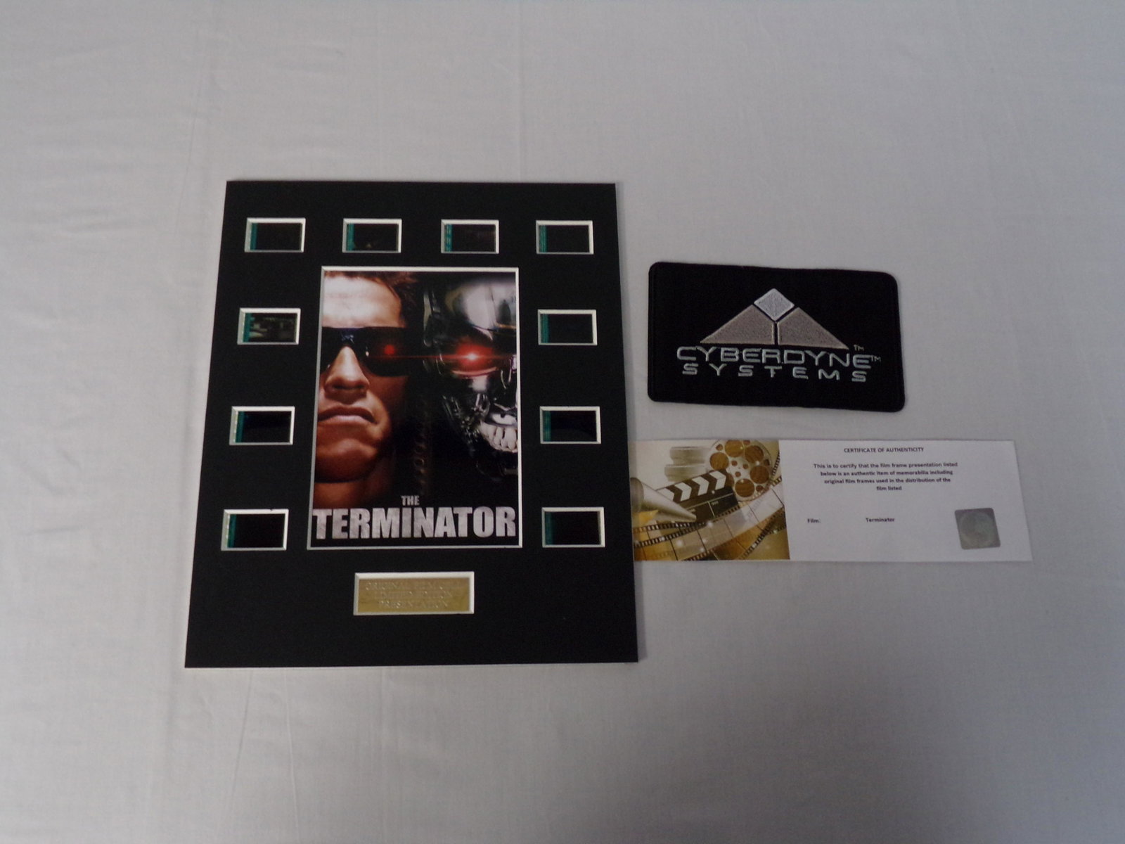 10x8 terminator 10 cell film cell w/cyberdyne systems: 10x8 terminator 10 cell film cell w/cyberdyne systems patch and COA