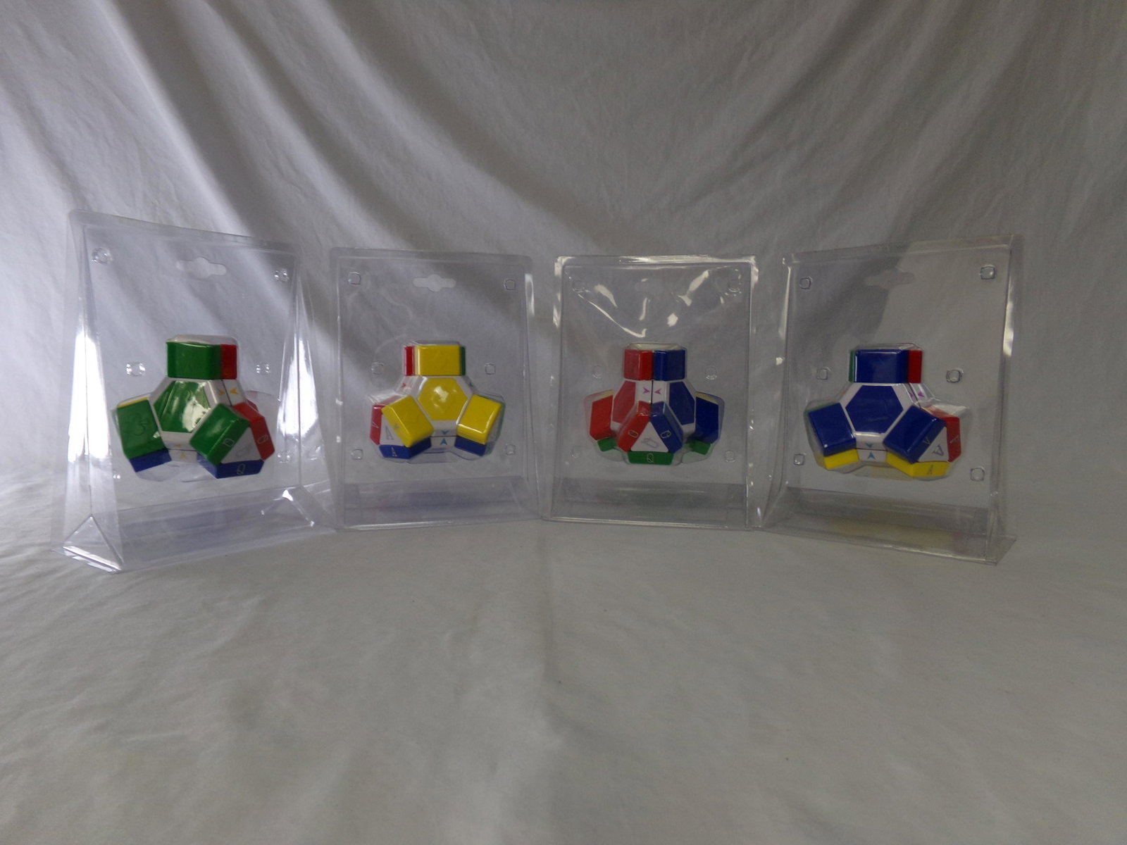 lot of 4 rubics cube type puzzle cubes: lot of 4 rubics cube type puzzle cubes