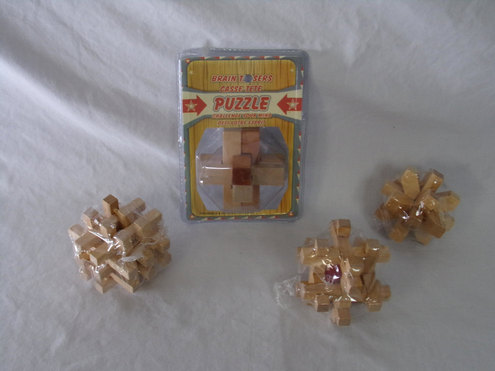 lot of 4 wooden brain teaser pluzzles: lot of 4 wooden brain teaser pluzzles