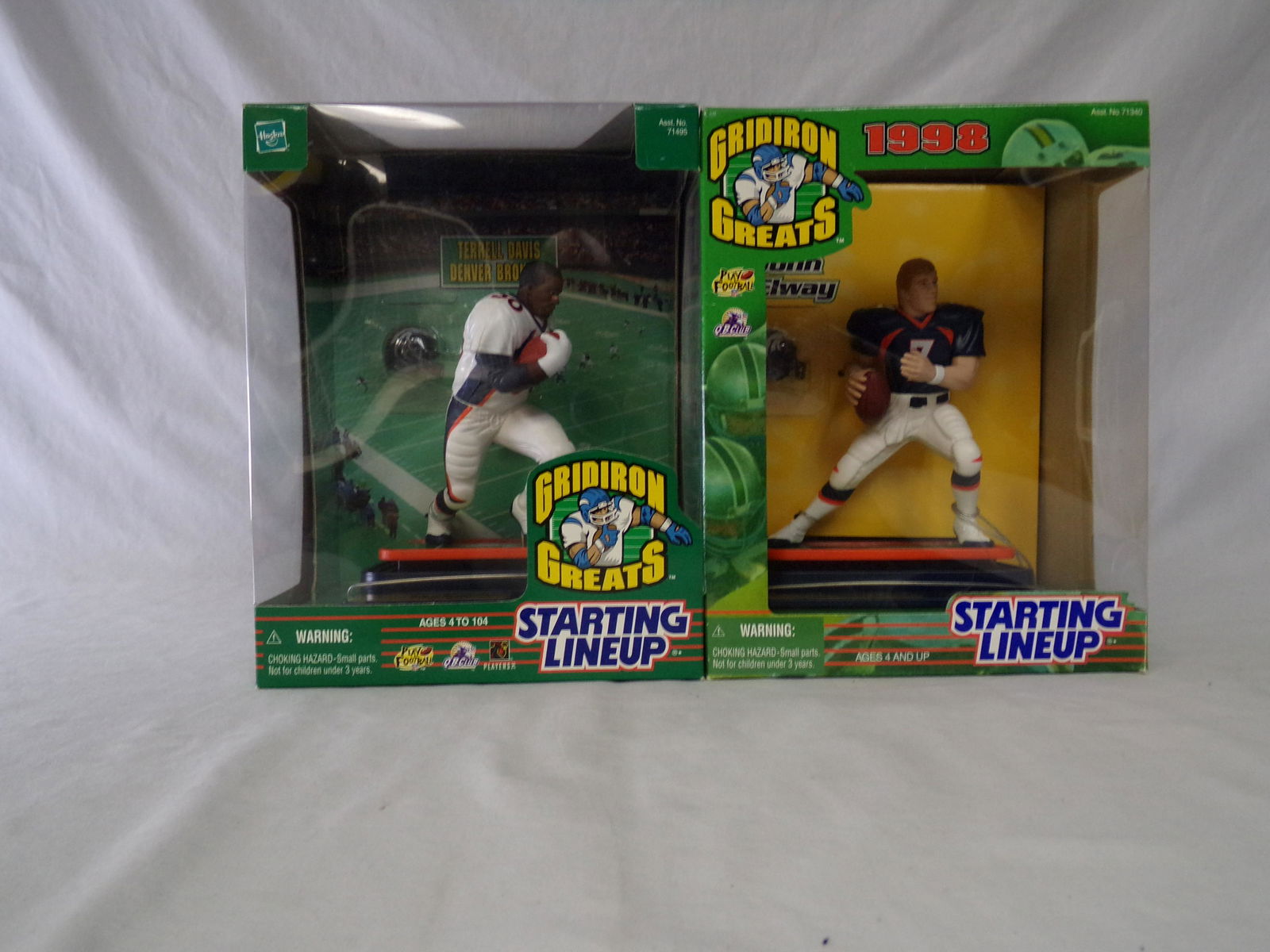 lot of 2 lrg starting line up w/ john elway & terrell (1 of 3)