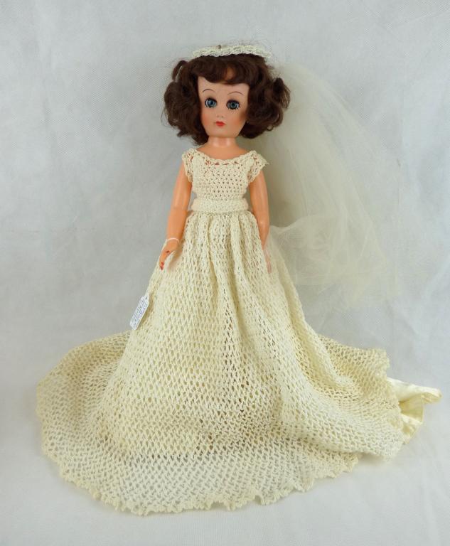 1950's 17" Fashion Doll Miss Revlon Like: Vintage 1950's Doll, marked 14R, Miss Revlon Like, 17" tall. Hard vinyl body, soft vinyl face, Satin & Crochet Brides Dress. Condition: Good