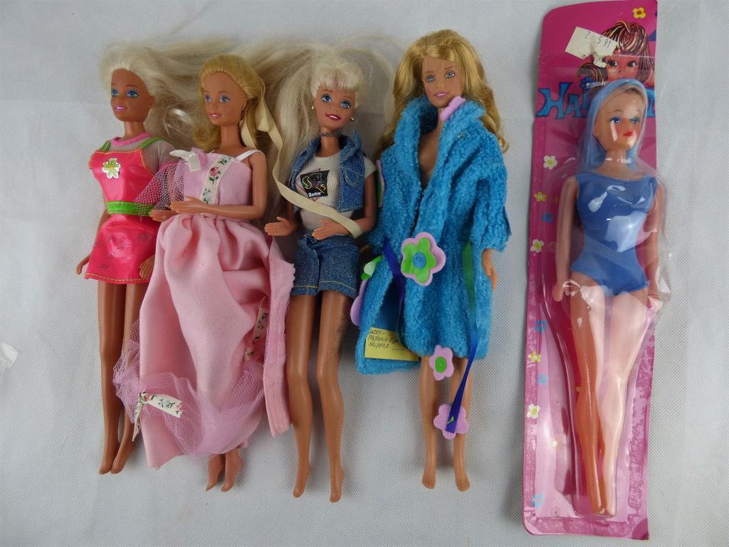Group of Vintage Barbie Dolls: Lot of Vintage Barbie Dolls and one Barbie Like doll in original Package