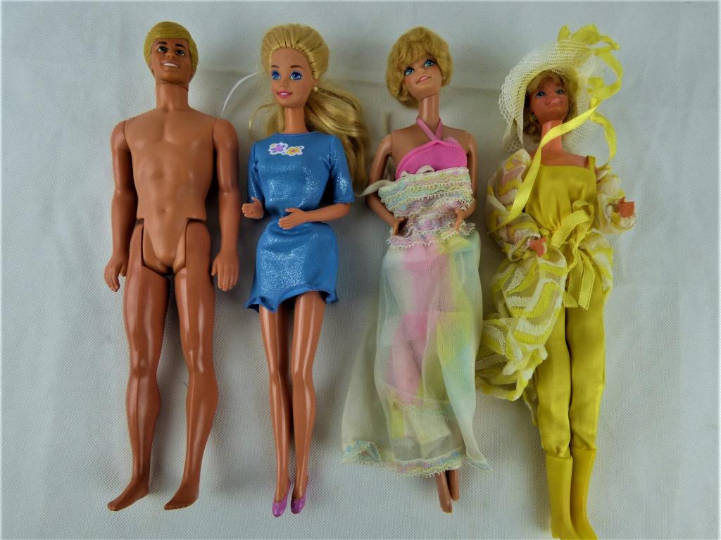 Barbies and Ken. Lot of 4 Dolls: Group of Vintage Barbie and Ken Dolls