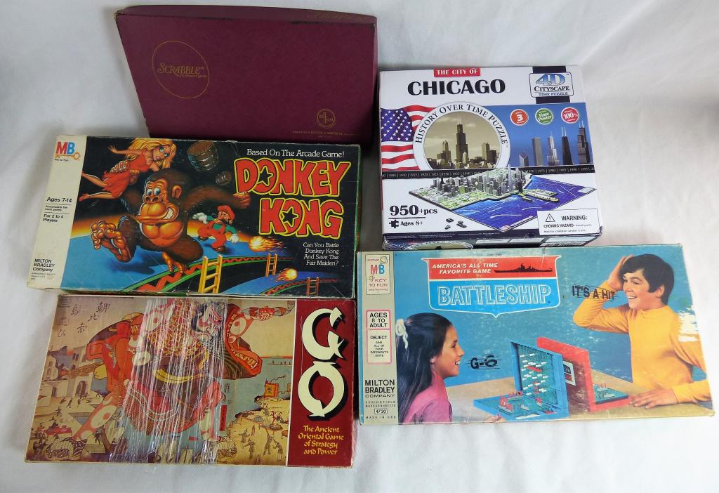 Group of Vintage Table Games- Donkey Kong, Go: Lot of Vintage Table Games- Donkey Kong, Go, Battleship, Scrabble and The City of Chicago 4D Puzzle. Condition: Used