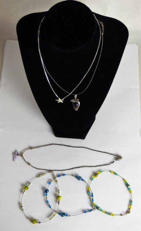 Sterling Silver Necklaces and Bracelets: Three SterlingSilver Necklaces and three bracelets with colorful beads. Condition: Good